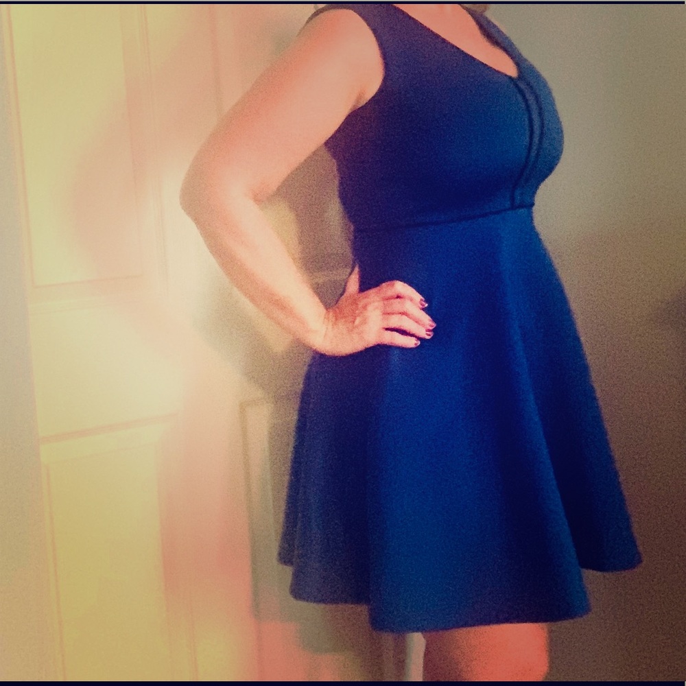 Sleeveless, Knee Length Blue Dress with Black Trim